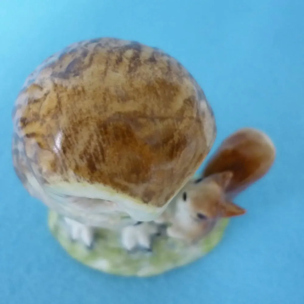 A Beswick Beatrix Potter Figurine Old Mr Brown. Gold Oval Backstamp BP2a.